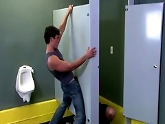Twink in bathroom sucks through gloryhole